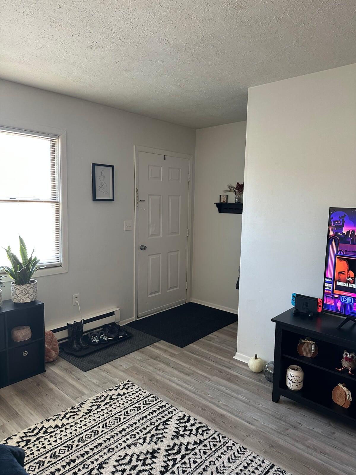 Entryway to Living Room and Upstairs